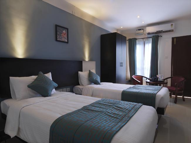 Aquarock Hotel Kazhakuttam Rum bild