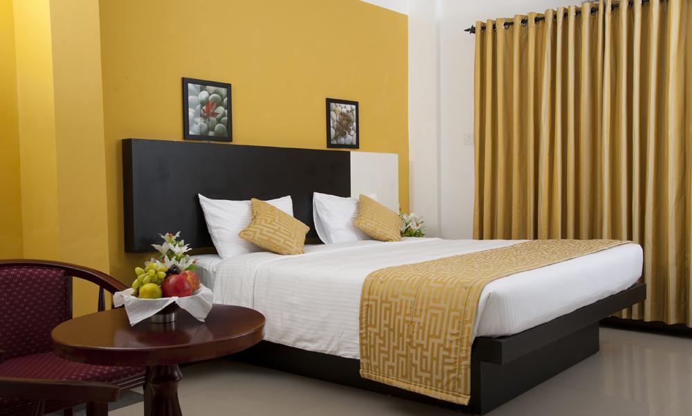 Aquarock Hotel Kazhakuttam Rum bild